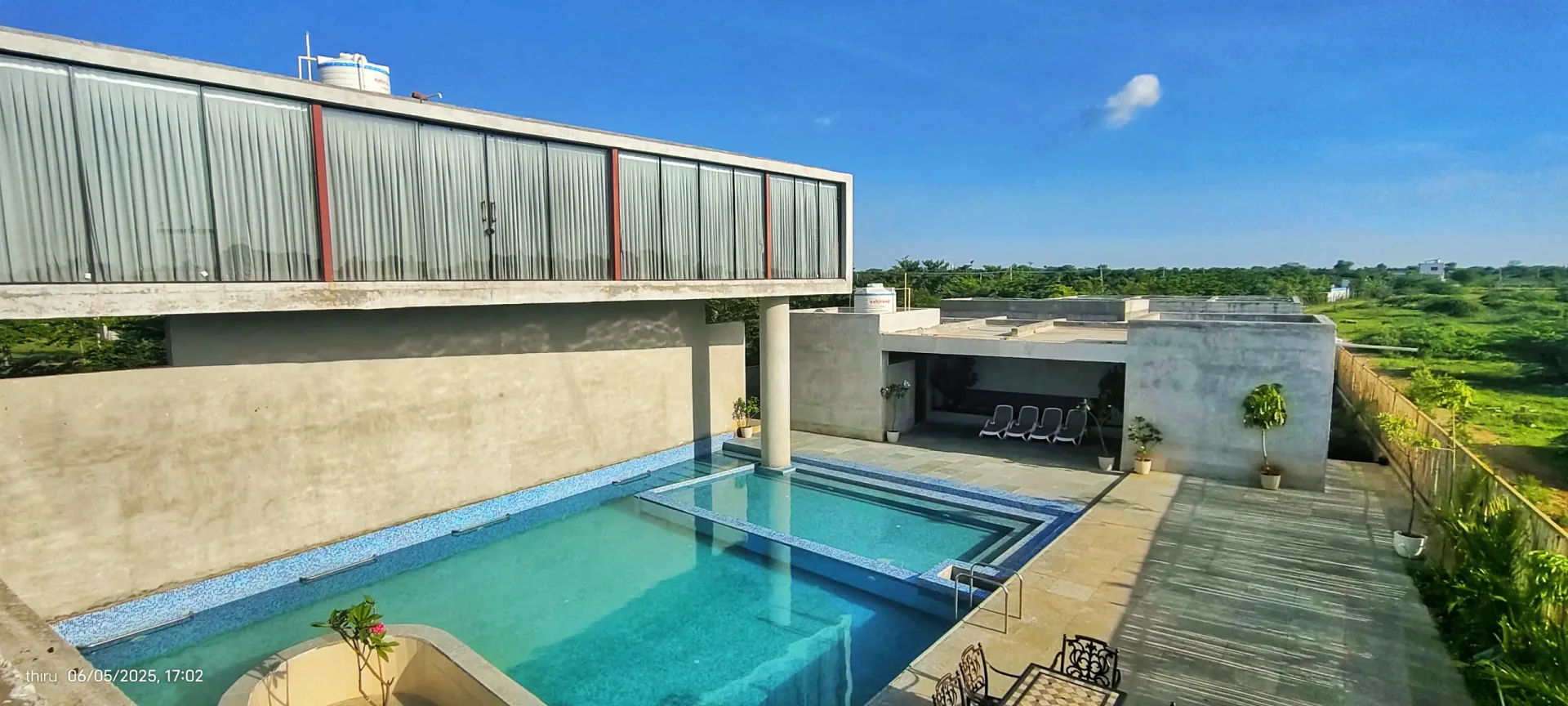Wide poolside view at R.House